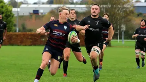 Evesham Rugby Club Jack Jeffery holding the ball