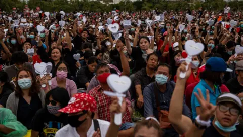 Lauren DeCicca/Getty Anti-government protestors rally at Sanam Luang