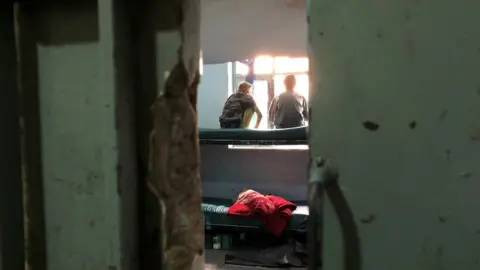 BBC Two boys sit on a bunkbed in a cell