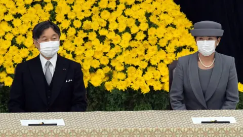 EPA Japan's Emperor Naruhito (L)