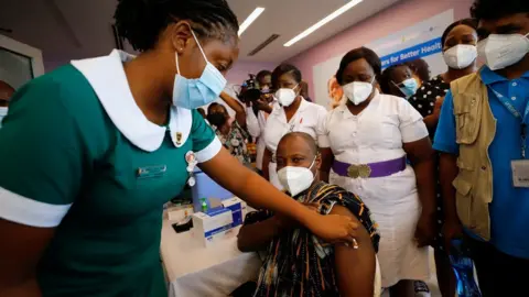 Reuters Director General of the Ghana Health Service Dr. Patrick Kuma-Aboagye receives the coronavirus vaccine