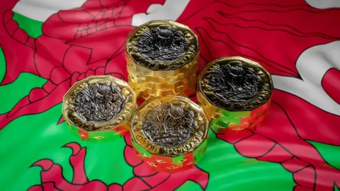 Getty Images Welsh flag with pounds on it