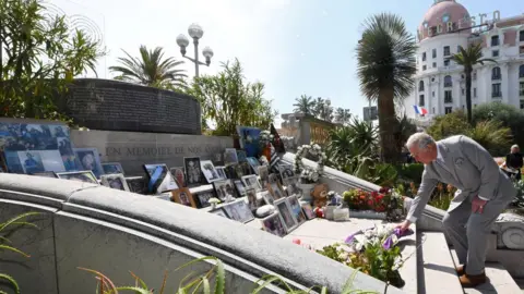 Reuters Prince Charles lays bouquet