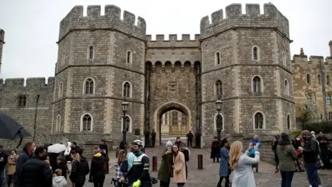 Reuters Wellwishers gather at the entrance to Windsor Castle