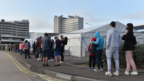 Getty Images People queuing for a Covid-19 test in Southend on 17 September 2020