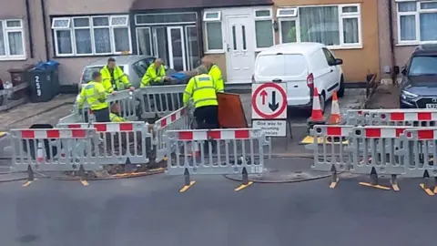 Amarjit Kaur/PA Gas engineers working in Galpin's Road in Thornton Heath, south London some time last week.