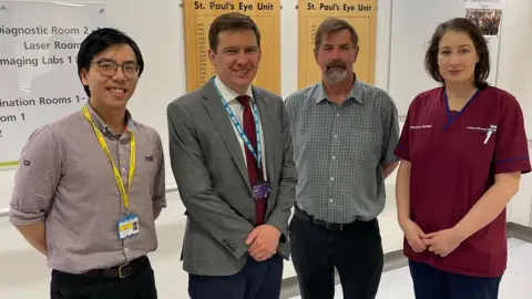 LUHFT (L-R) Dr Jason Lee, Clinical Research Fellow at LUHFT; Dr Phill Burgess, Honorary Consultant Ophthalmologist at St Paul’s Eye Unit at LUHFT; patient Steve Gotts, and Florina Caban, Research Nurse at LUHFT