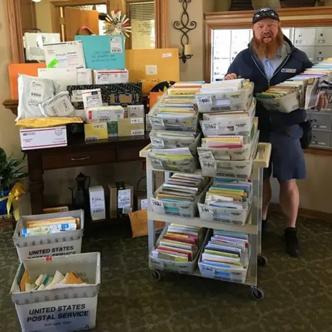 Brookdale Midwestern Postman delivers hundreds of birthday cards for Joe