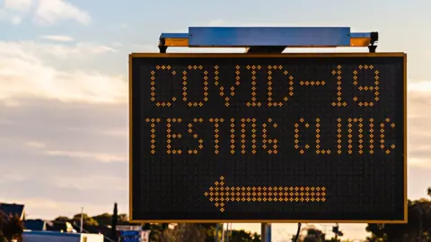 Getty Images covid-19 testing clinic sign