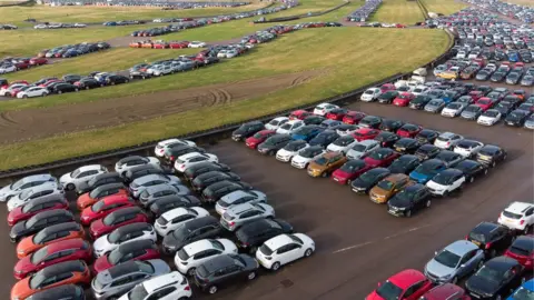 PA Media Cars stored at the Rockingham Motor Speedway circuit