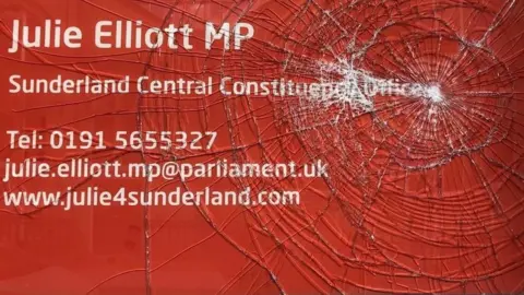 Julie Elliott Damages window