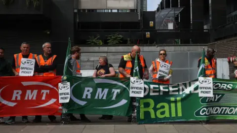 Getty Images Picket lines are common sights during strike action