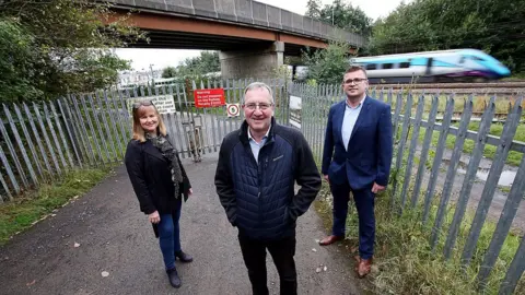 Durham County Council L-R) Cllr Elizabeth Scott, Durham County Council's Cabinet member for economy and partnerships, Sedgefield MP Paul Howell, and Craig MacLennan, the council's transport and infrastructure projects manager