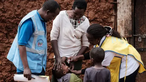 Getty Images Child getting polio vaccination in Kenya