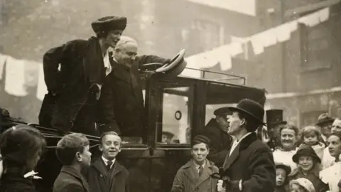 Plymouth Museums Archive Nancy Astor stood above crowds