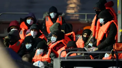 Reuters Migrants arriving in Dover on a UK Border