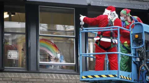 Press Eye Santa on cherry picker at Leeds Children's Hospital