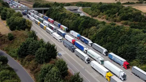 PA Media Lorries queuing during Operation Brock on the M20 near Ashford in Kent