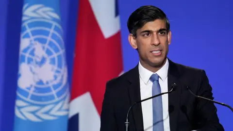 Then-Chancellor Rishi Sunak speaking at COP26 in Glasgow