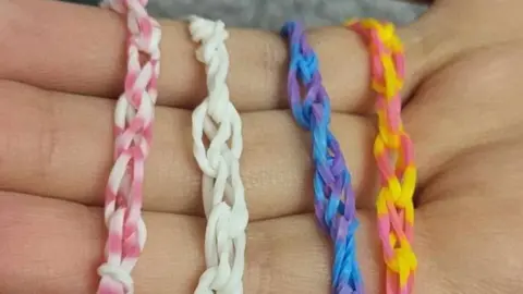 Family photo Four Loom bracelets on a hand