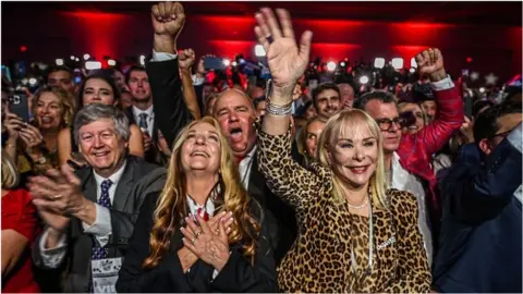 voters celebrating