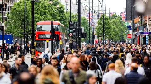 Getty Images Crowds on Oxford Street