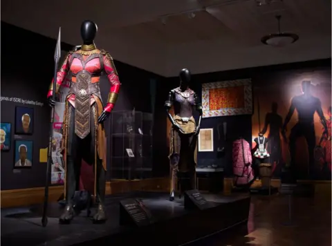 BBC The idea to showcase the costumes came from the museum after they were asked by their community panel to come up with something "exciting and relevant for more people"