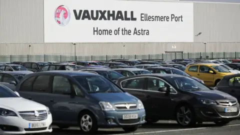 Getty Images Vauxhall cars parked outside the Ellesmere Port plant.