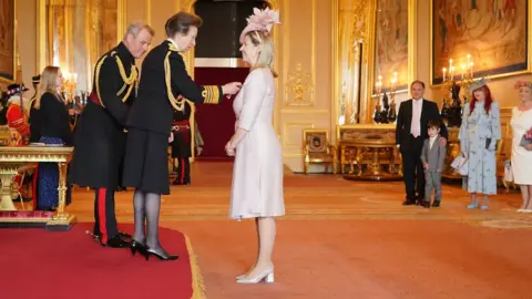 PA Media Andrea Jenkyns MP receives her damehood from Princess Anne at Windsor Castle