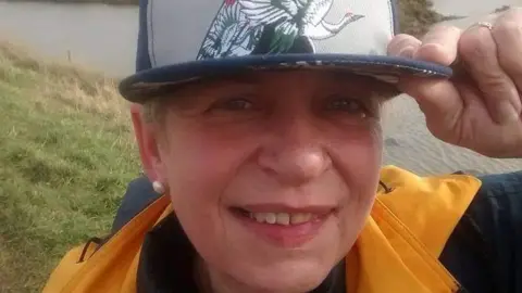 Caroline Page Caroline Page wearing a hat