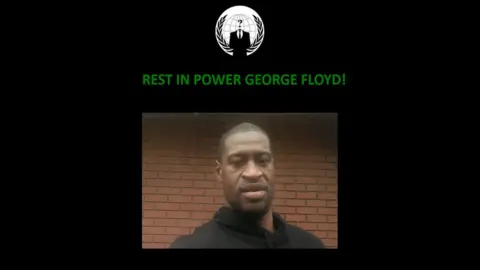 UN A black page shows the anonymous logo, a photo of George Floyd, and the message "rest in power".