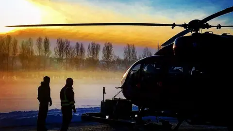 Dr Gareth Roberts  Wales Air Ambulance and crew at sunrise