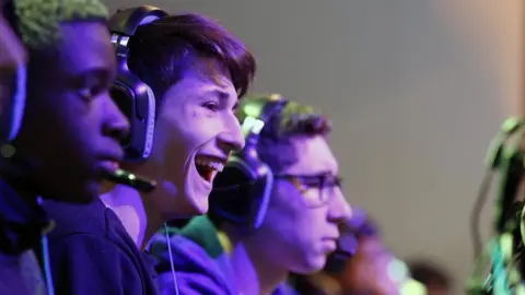 Getty Images  Teenagers playing video games