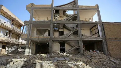 TASNIM news agency via reuters A building in Sarpol-e Zahab county in Kermanshah