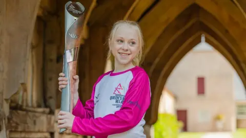 Getty Images Erin Guild was the baton bearer at Dumfries House near Cumnock