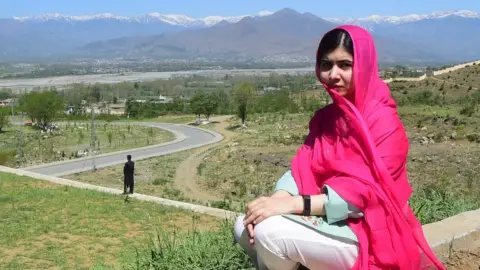 AFP/Getty Malala Yousafzai, sat and staring into the camera in Pakistan