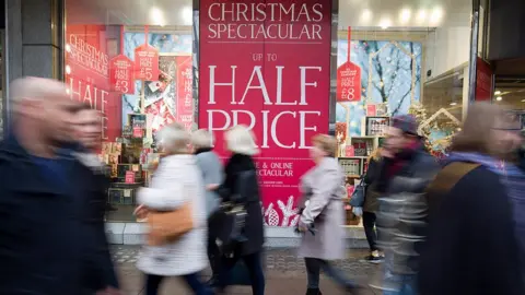 Getty Images Christmas shoppers