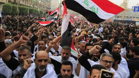 EPA Protesters demonstrate against alleged Iraqi government corruption and poor government services in the holy city of Karbala on 19 October, 2019