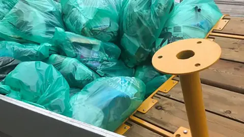 Andrew Leonard Parklet being taken away on the back of a truck