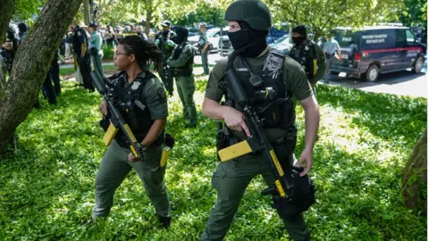 Getty Images Atlanta police with weapons
