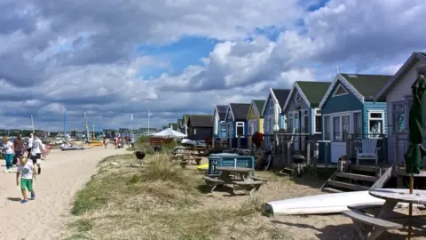 Paul Buckingham Beach huts and Mudeford Spit