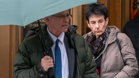 Getty Images Barbara Fried and Allan Joseph Bankman, parents of FTX Co-Founder Sam Bankman-Fried, depart from federal court on March 28, 2024 in New York City.