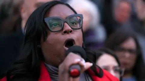 LaMonica McIver speaks into a microphone