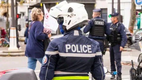 Getty Images Illustration of a motorcycle police officer, a police officer of the National Police in Paris, France, on September 28, 2024. 