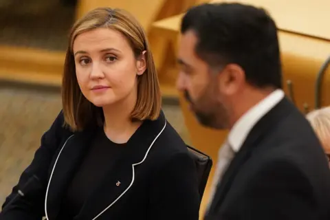 PA Media Mairi McAllan and Humza Yousaf