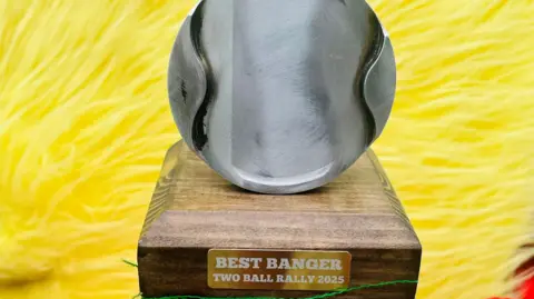 John and Mark Everett An award that reads 'Best Banger - Two Ball Rally 2025'