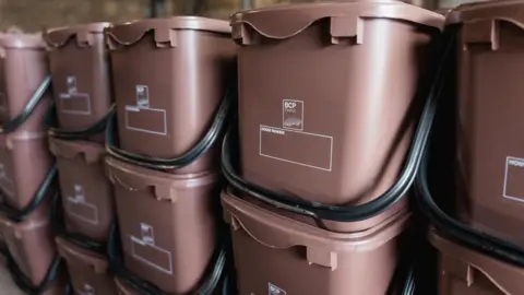 Brown food waste caddies