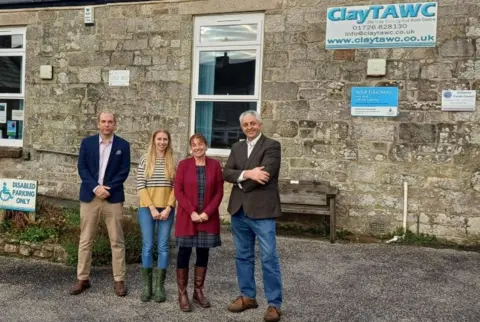 Louis Gardner (l) and Dick Cole (r) with two others outside the ClayTAWC