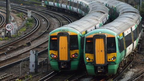 Southern Rail trains make their way in and out of Victoria Station