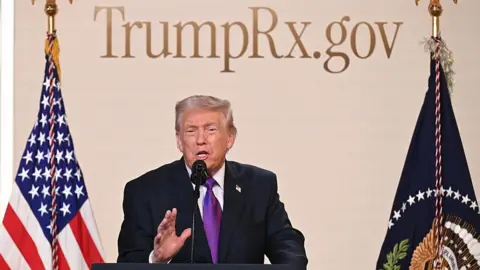 AFP via Getty Images US President Donald Trump speaks to introduce the new TrumpRx website in the South Court Auditorium of the White House in Washington, DC, on February 5, 2026.